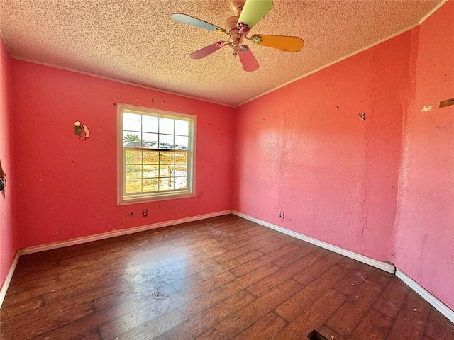 unfurnished room with wood-type flooring, ceiling fan, and ornamental molding