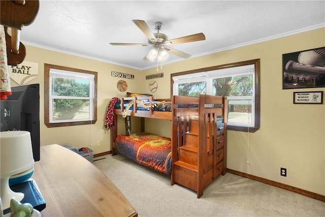 bedroom featuring light carpet, multiple windows, ornamental molding, and ceiling fan