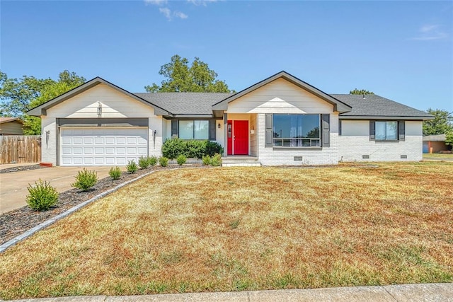 ranch-style house with a front yard and a garage