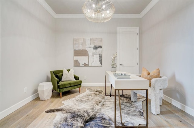 office area with hardwood / wood-style floors, crown molding, and a notable chandelier