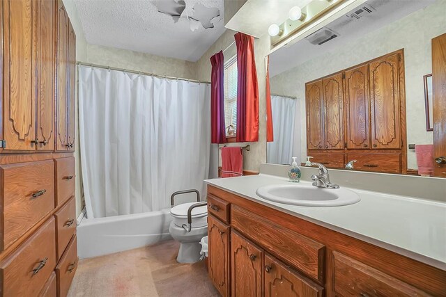 128 W Quail Dr, Cordell, OK 73632 - full bath featuring toilet, vanity, shower / bath combo, and a textured ceiling