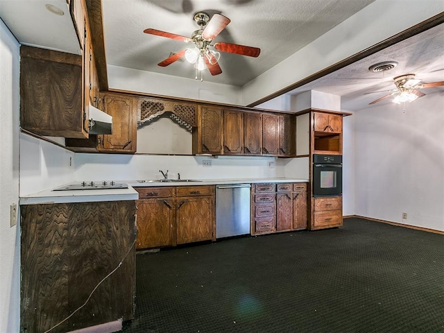 kitchen featuring black appliances, ceiling fan, sink, and dark colored carpet