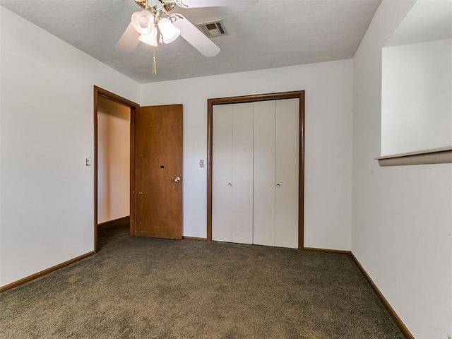 unfurnished bedroom with carpet flooring, a closet, and ceiling fan