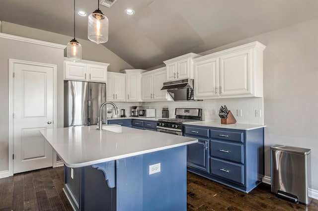 kitchen with white cabinetry, sink, dark wood-type flooring, blue cabinets, and appliances with stainless steel finishes