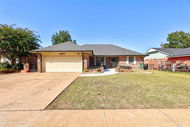 ranch-style house with a garage and a front yard