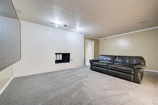 living room featuring a multi sided fireplace, crown molding, carpet floors, and a textured ceiling