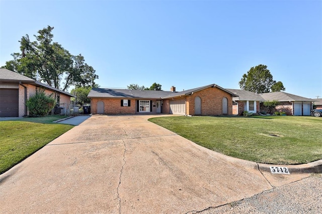 ranch-style home with a front lawn