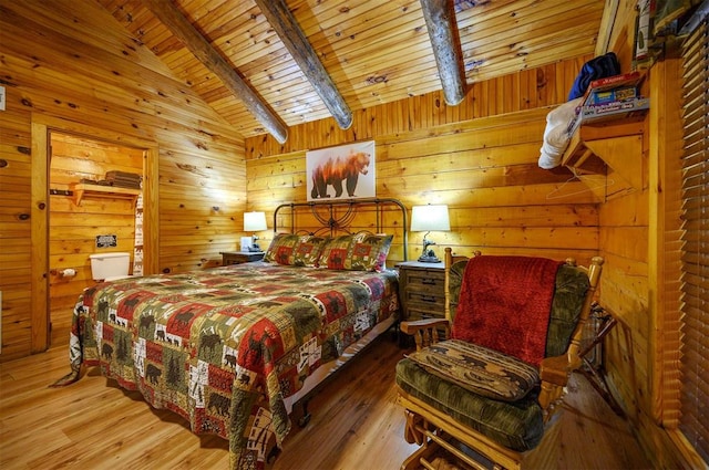 bedroom featuring vaulted ceiling with beams, wooden walls, wood ceiling, and hardwood / wood-style flooring