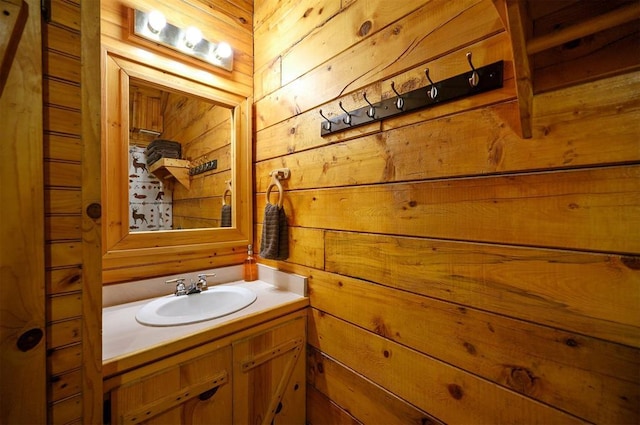 130 Wildwood Trl, Broken Bow, OK 74728 - bathroom with wood walls and vanity