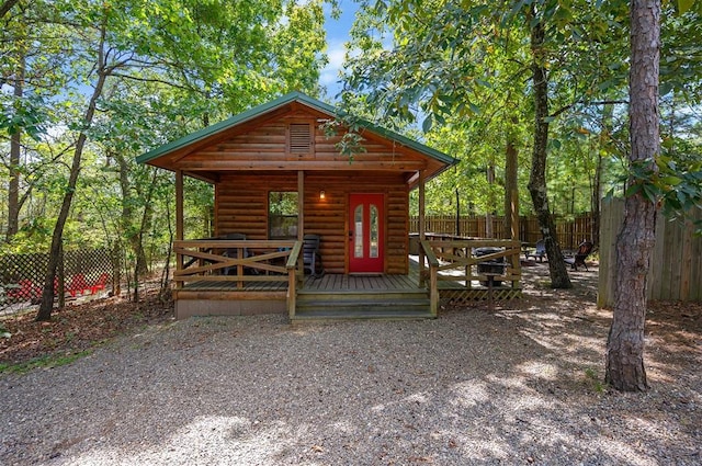 view of front of property featuring a wooden deck