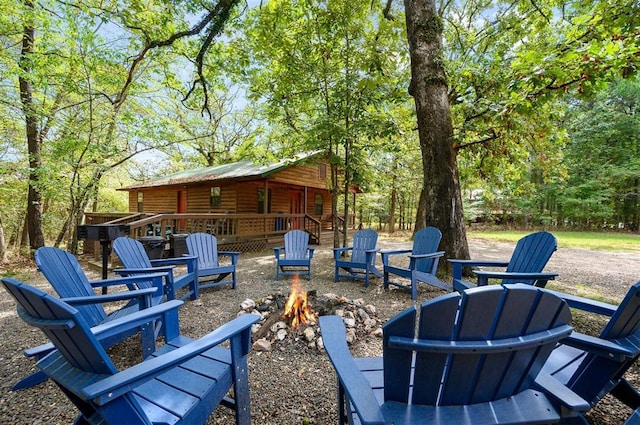 130 Wildwood Trl, Broken Bow, OK 74728 - view of yard featuring a fire pit