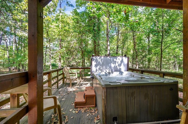183 Pine Meadow Ln, Broken Bow, OK 74728 - wooden terrace featuring a hot tub and a forest view