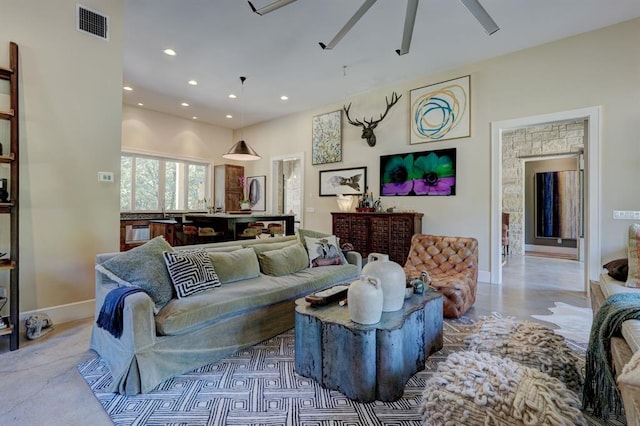 living room featuring ceiling fan