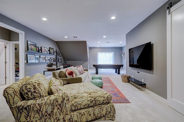 living room with light carpet, a barn door, and billiards