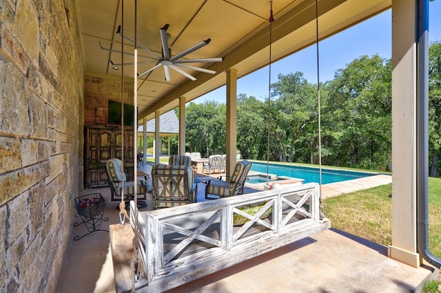 view of patio / terrace featuring ceiling fan