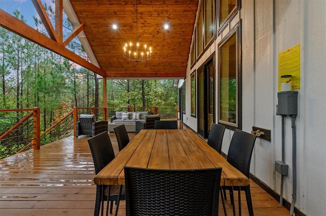 deck at dusk with an outdoor living space