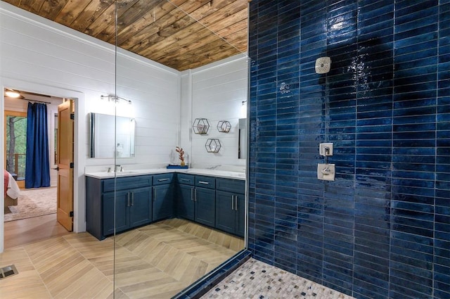 bathroom featuring vanity, tile patterned floors, and wood ceiling