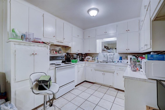 kitchen featuring custom exhaust hood, white appliances, white cabinets, sink, and light tile patterned floors