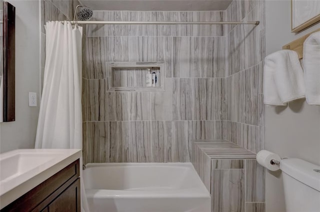 full bathroom featuring vanity, toilet, and shower / tub combo