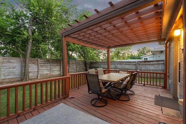 deck featuring a pergola and a yard