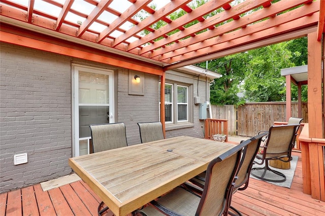 wooden terrace with a pergola