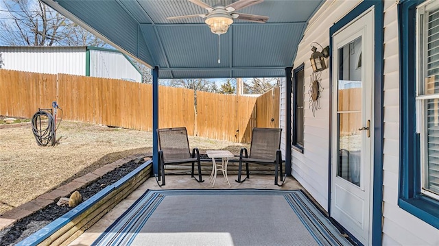 view of patio / terrace featuring a porch and ceiling fan