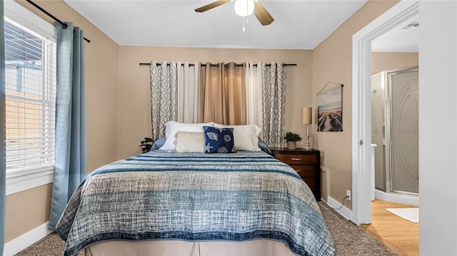 bedroom with hardwood / wood-style flooring and ceiling fan