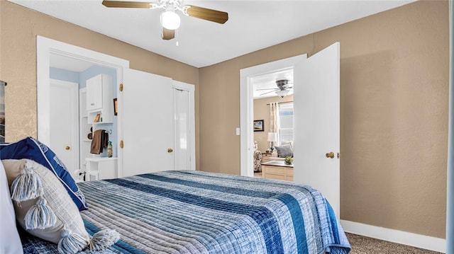 carpeted bedroom with ceiling fan