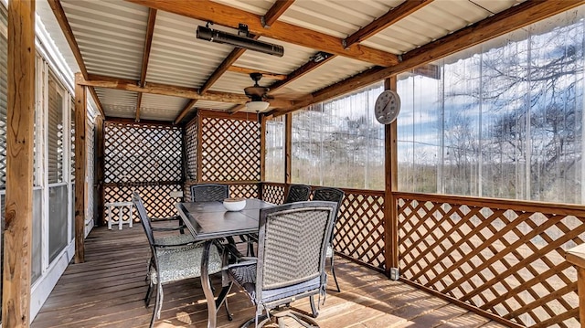 wooden deck featuring ceiling fan