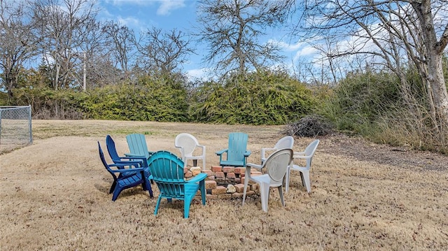 view of patio / terrace featuring an outdoor fire pit