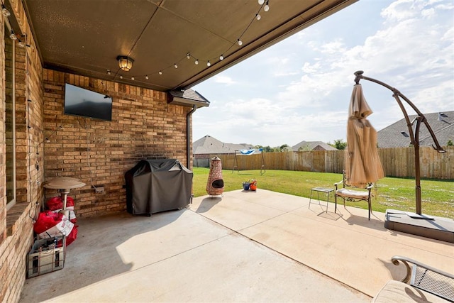 view of patio with area for grilling