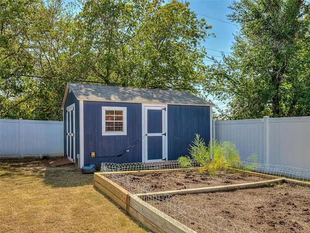 view of outbuilding featuring a lawn