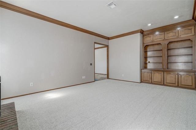 unfurnished living room with light colored carpet and ornamental molding