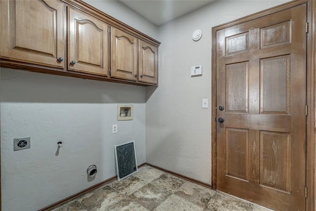 washroom featuring washer hookup, electric dryer hookup, and cabinets