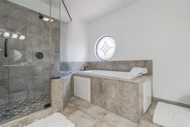 bathroom with shower with separate bathtub