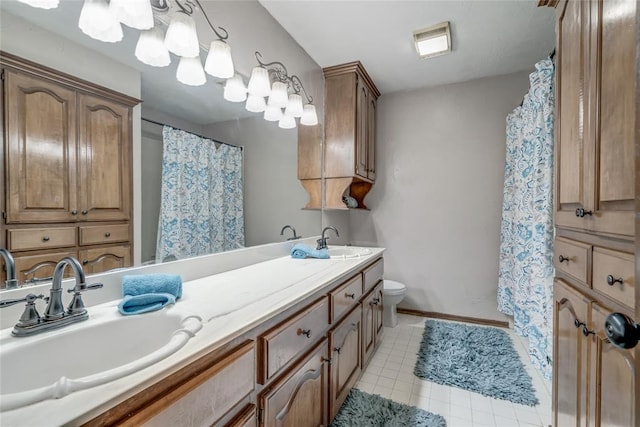 bathroom featuring tile patterned floors, vanity, toilet, and a shower with shower curtain