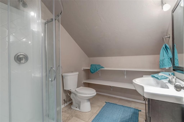 bathroom featuring walk in shower, tile patterned floors, lofted ceiling, toilet, and vanity