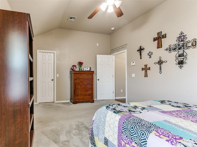 carpeted bedroom featuring ceiling fan and lofted ceiling