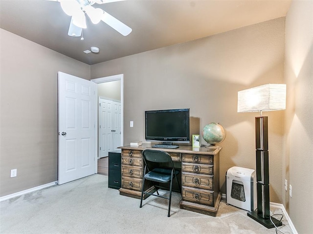 office featuring light carpet and ceiling fan