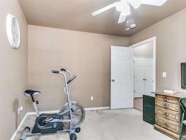 exercise room featuring ceiling fan