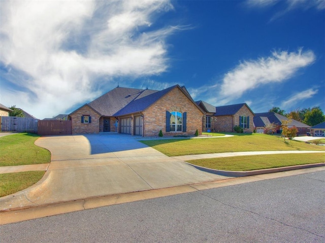 view of front facade featuring a garage and a front yard