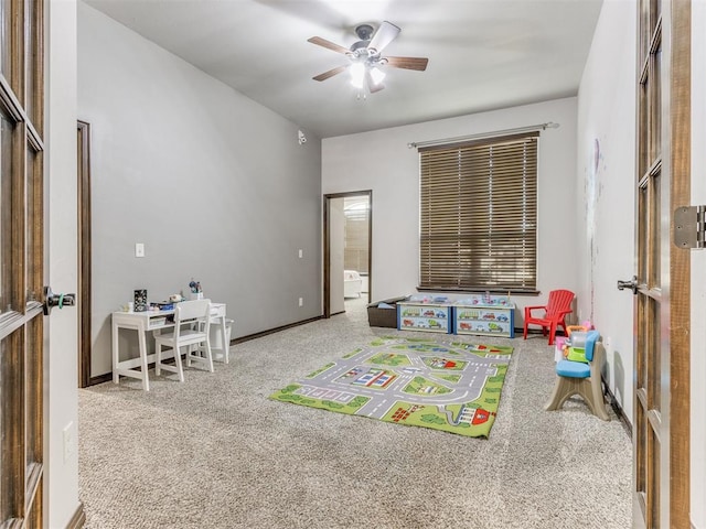 recreation room with carpet and ceiling fan