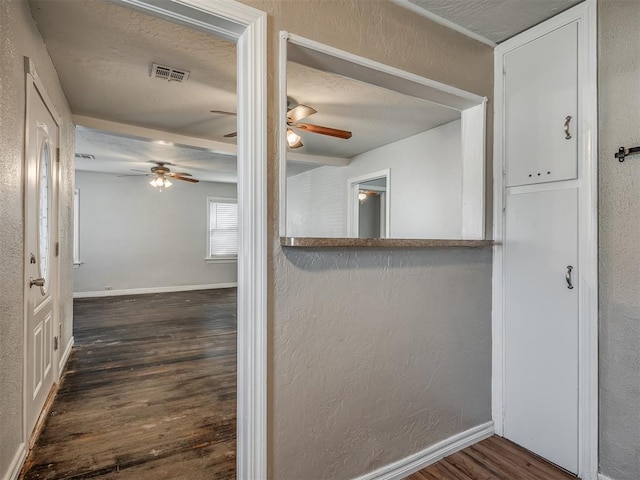 interior space with dark wood-type flooring