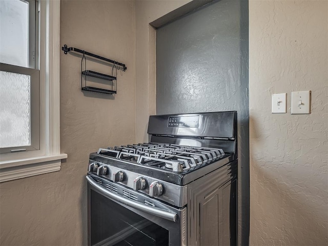 kitchen with stainless steel gas range