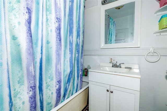 bathroom with vanity and shower / bathtub combination with curtain