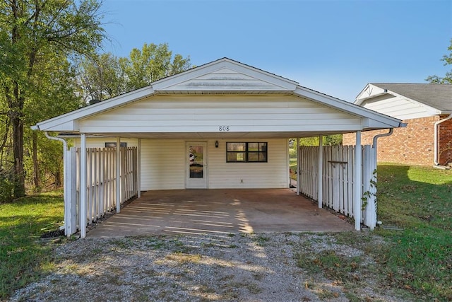 view of front facade featuring a carport