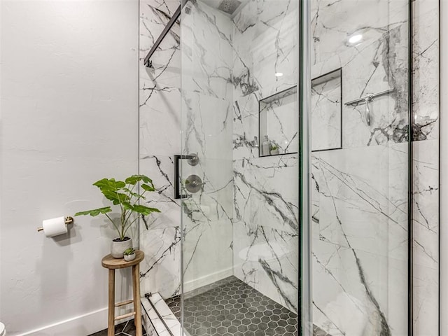 bathroom featuring an enclosed shower