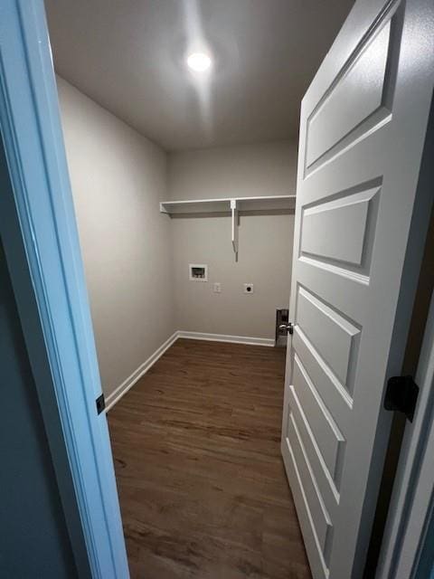 laundry area with dark wood-type flooring, hookup for a washing machine, and electric dryer hookup