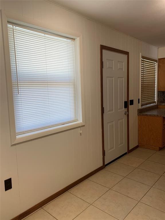 interior space featuring light tile patterned floors