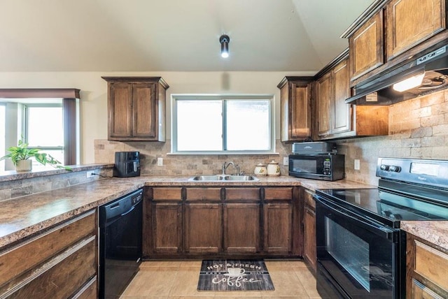 kitchen with premium range hood, black appliances, sink, decorative backsplash, and light tile patterned flooring